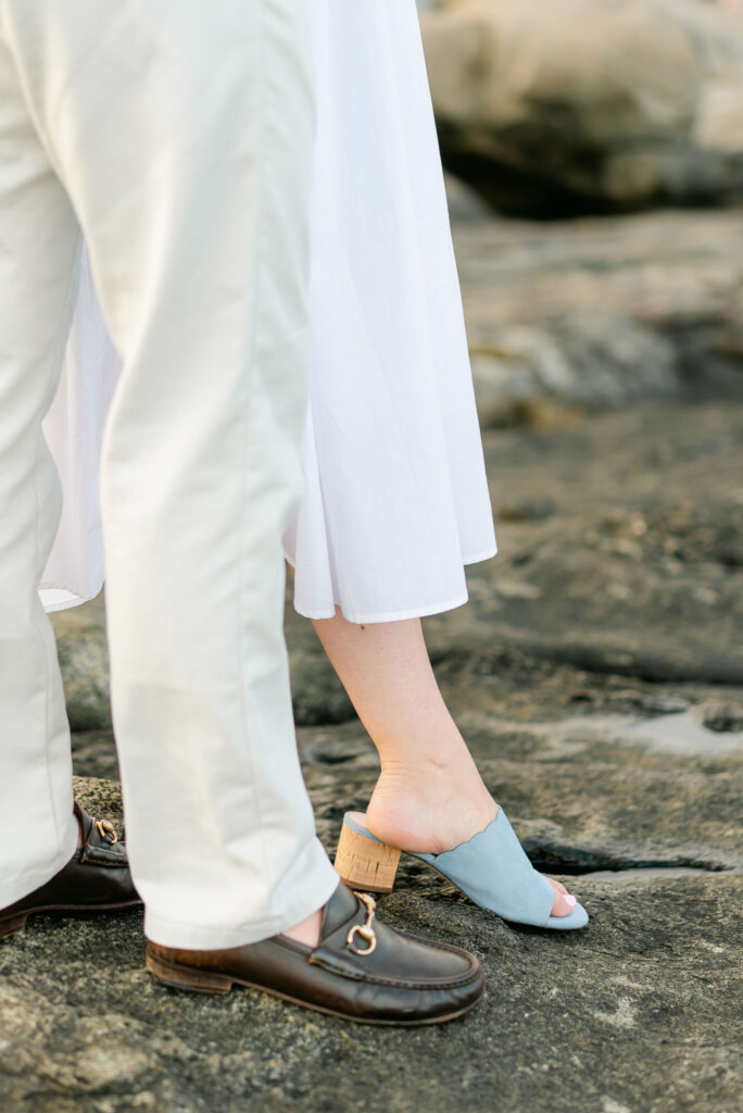 coastal maine engaged couple gucci loafers heels