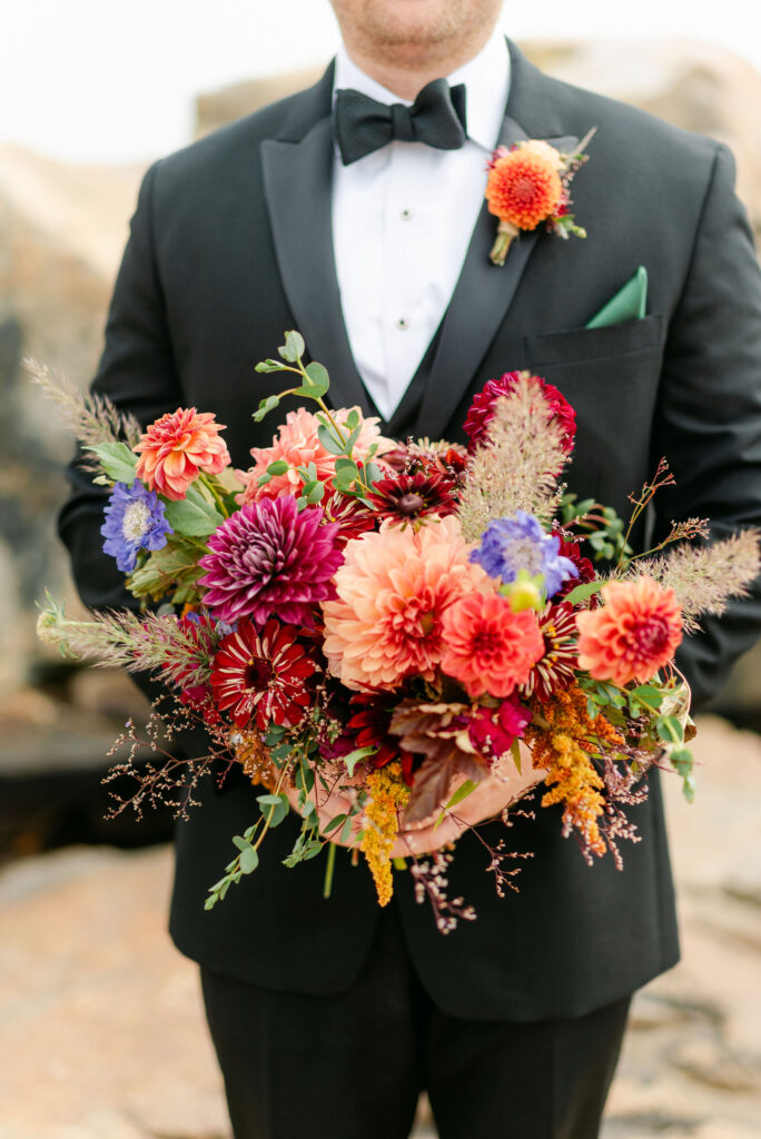 colorful wedding bouquet florals groom tux
