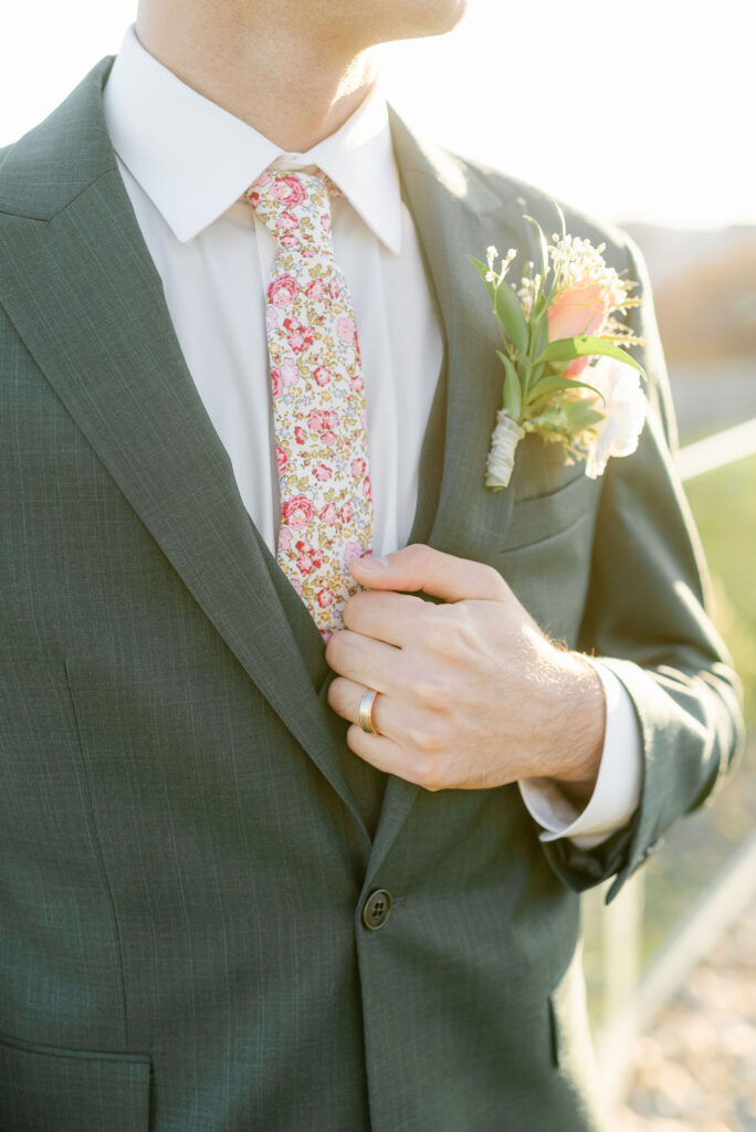 groom wedding attire green suit pink tie