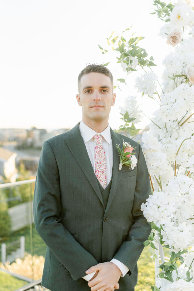 groom wedding attire green suit pink tie