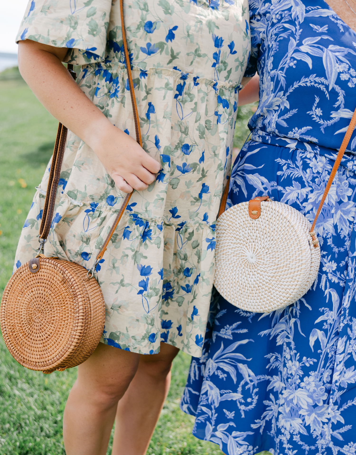 Colorful guest dress code ideas featuring vibrant orange and red attire that complement citrus florals at a joyful Maine wedding.