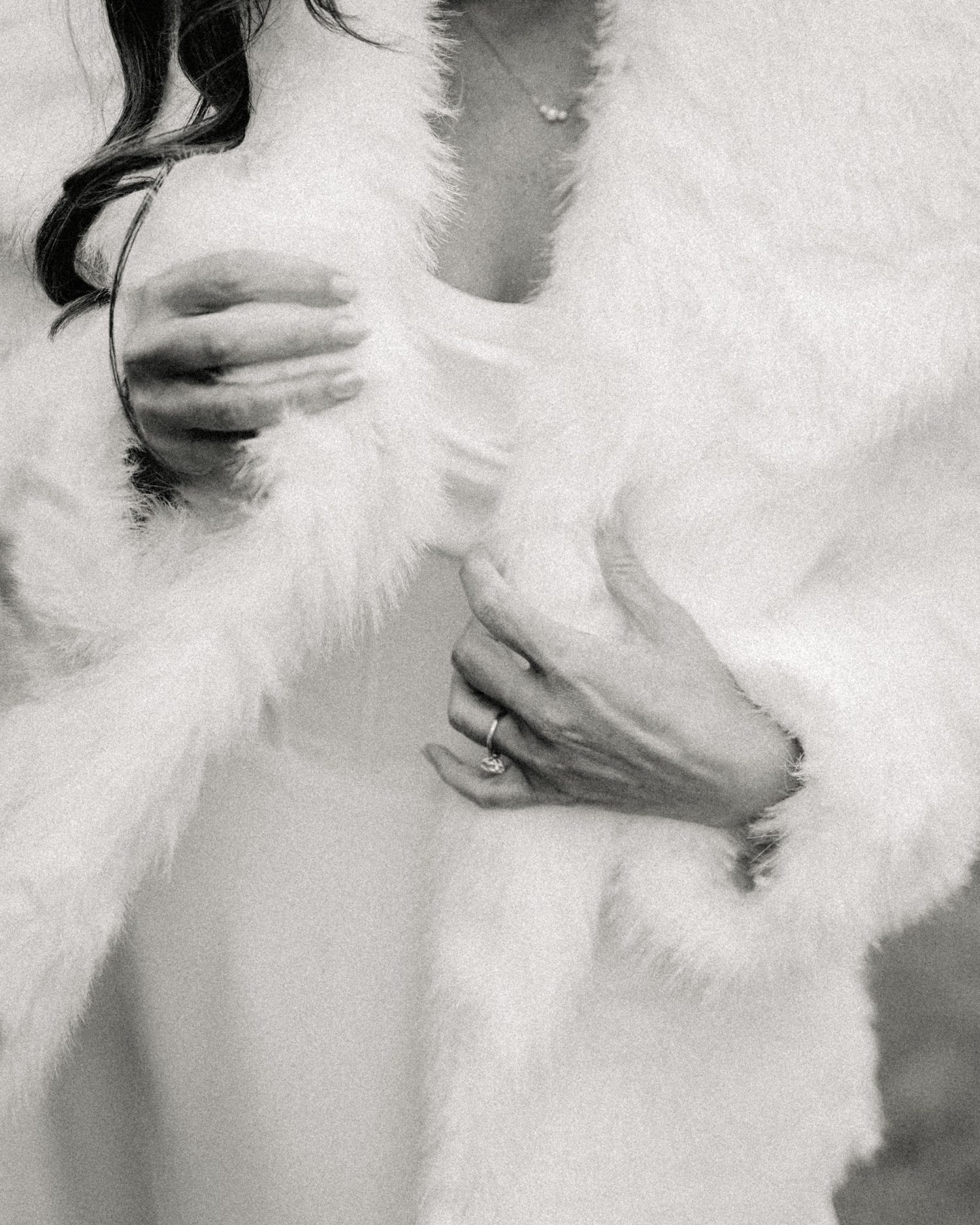 Bride wrapped in a white coat outside of Asticou Hotel Wedding.
