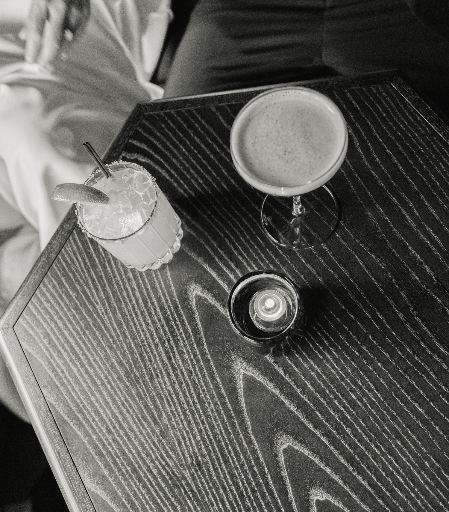 Bride and Groom celebrating inside the bar at the Asticou Hotel during their cozy fall micro-wedding.